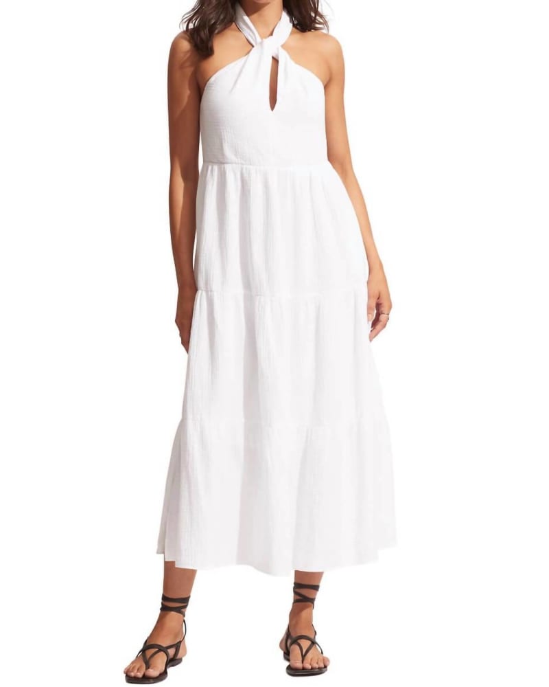 Front of a model wearing a size L Halter Neck Dress in White in White by Seafolly. | dia_product_style_image_id:336298